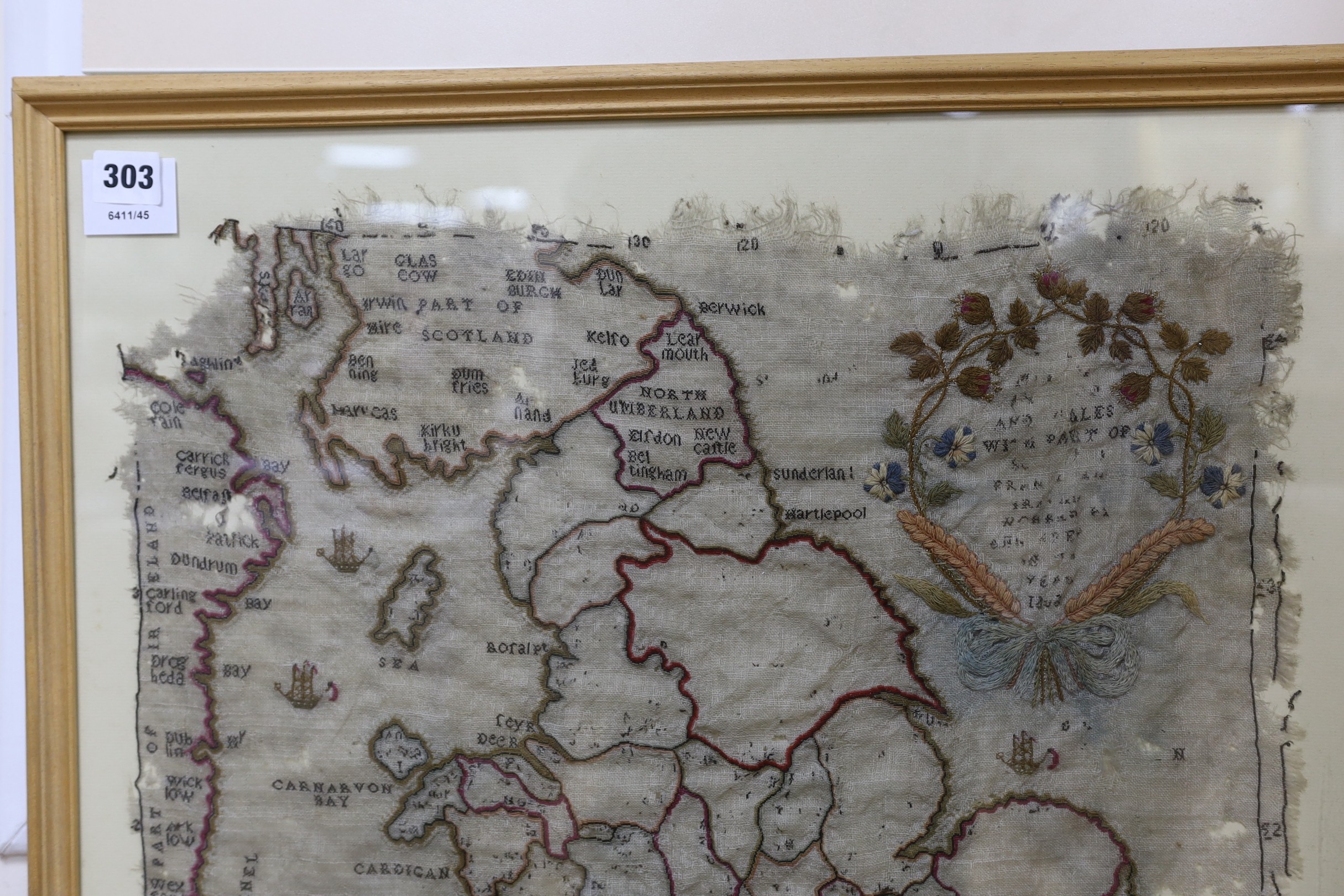 A framed early 19th century map sampler of England and parts of Scotland and Wales. 55x49cm excl frame